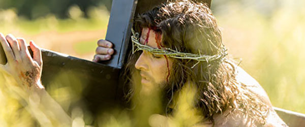 Man carrying the cross in Oberammergau Passion Play